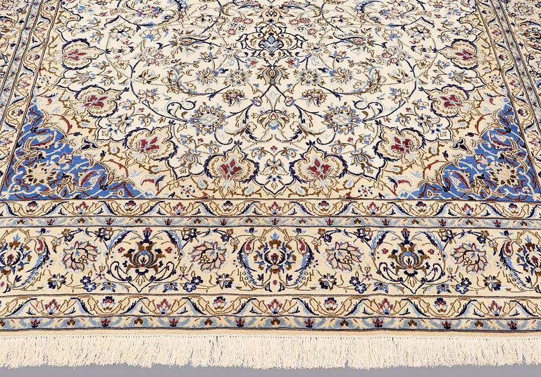 A carpet, Nain part silk, 364 x 256 cm.