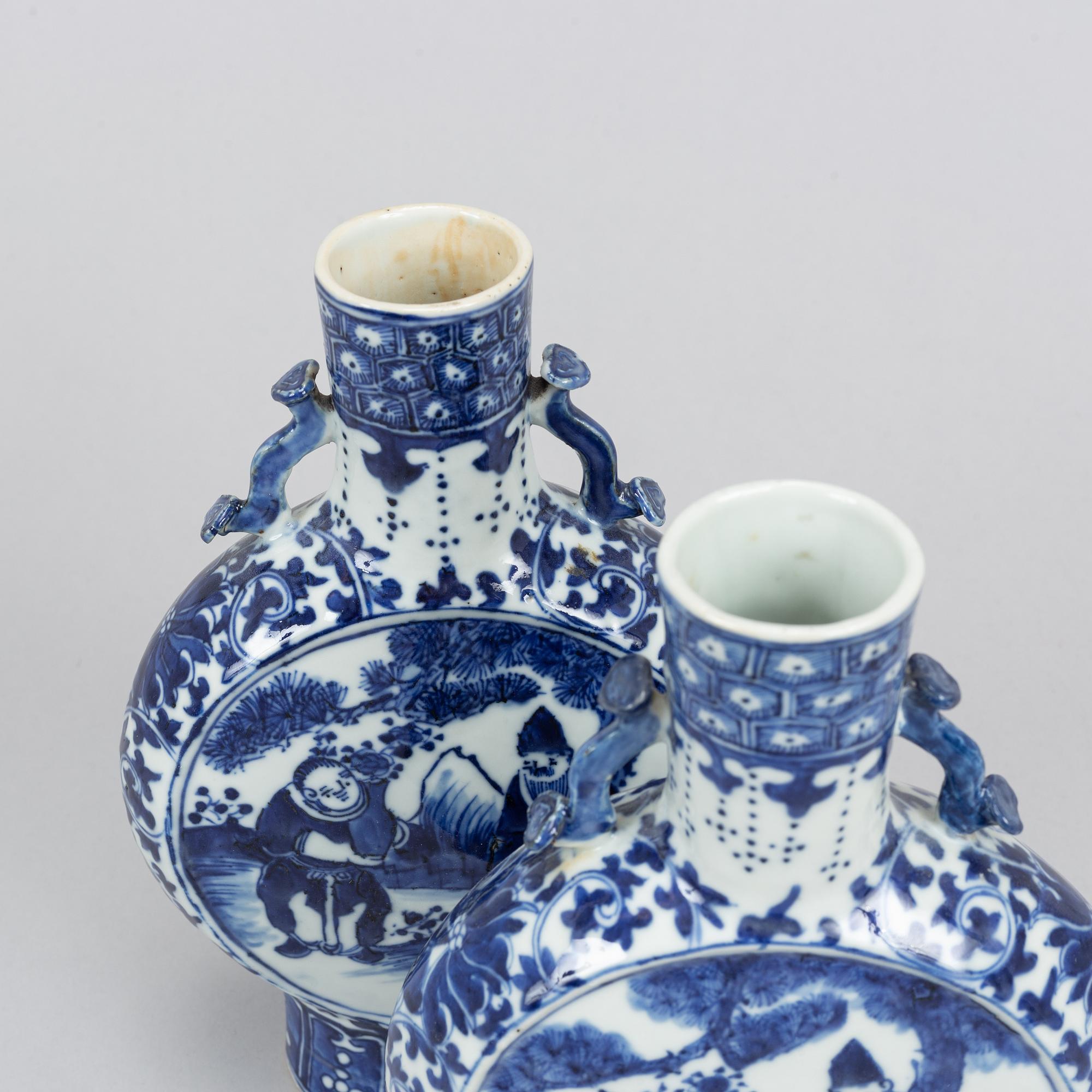 A pair of blue and white moon flasks, Qing dynasty, 19th Century.