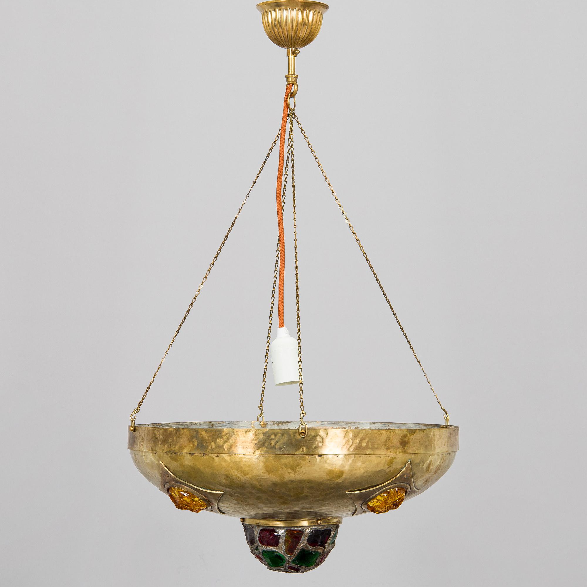 Kattovalaisin, 1900-luvun alku.