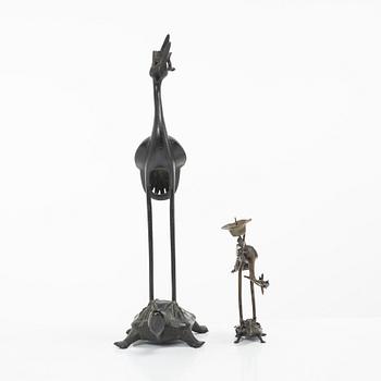 Two bronze sculptures/candle holders, Japan & China, 20th century.