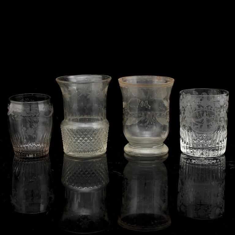 A set of four odd beaker glases, 19th Century.