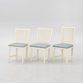 A matched set of 11 painted chairs 18th and 19th century.