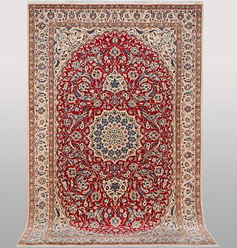 A Nain part silk carpet, 6 laa, c. 295 x 178 cm.