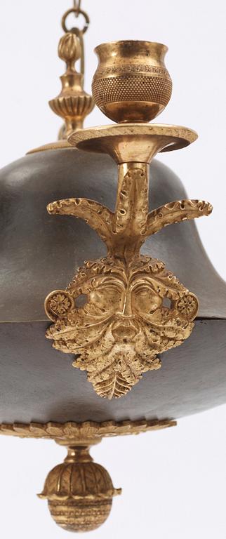 An Empire early 19th century three-light hanging lamp.