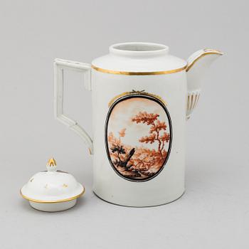 A large enamelled porcelain coffee pot with cover, probably Germany, Empire, 19th century.