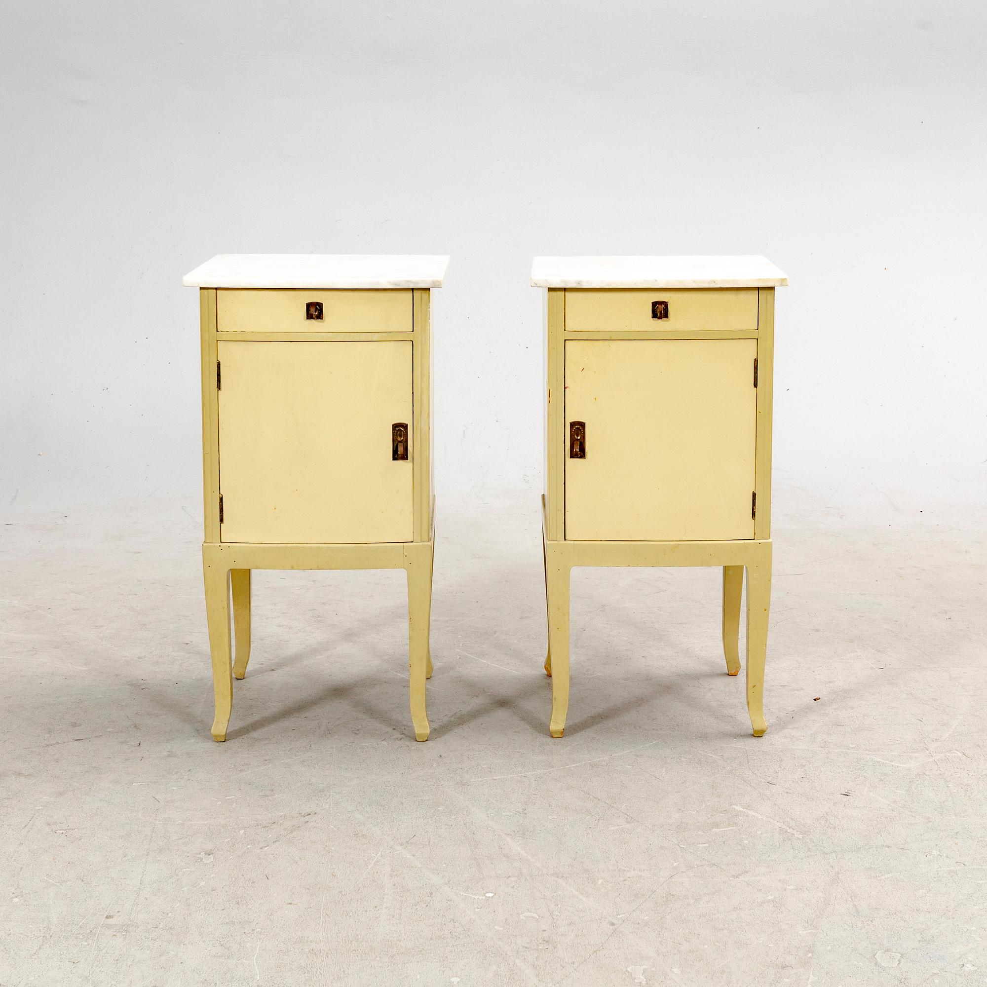 A pair of painted bedside tables first half of the 20th century.