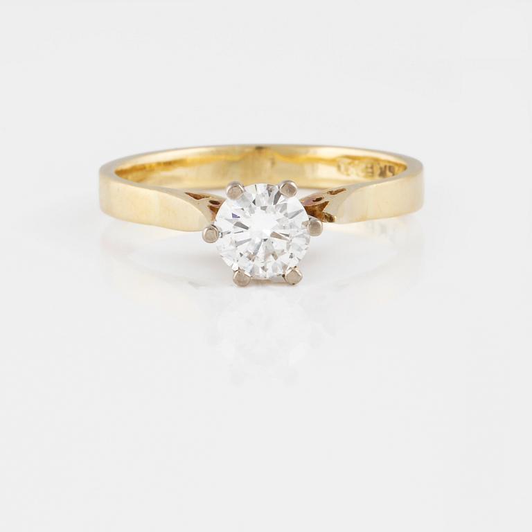 RING, 18K guld och vitguld med briljantslipad diamant 0.59. Vikt 3,2 gram.