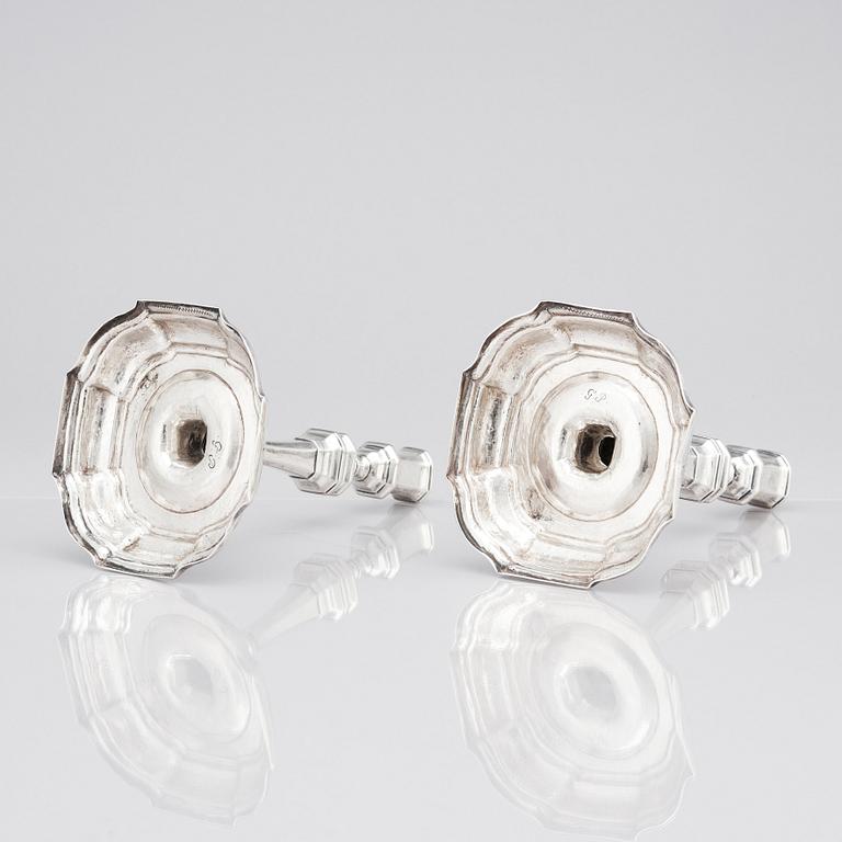 A pair of Swedish early 18th century silver candlesticks, mark of Petter Ersson Lund, Stockholm 1727.