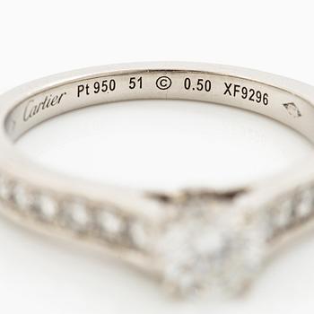 Cartier two rings platinum with round brilliant-cut diamonds.