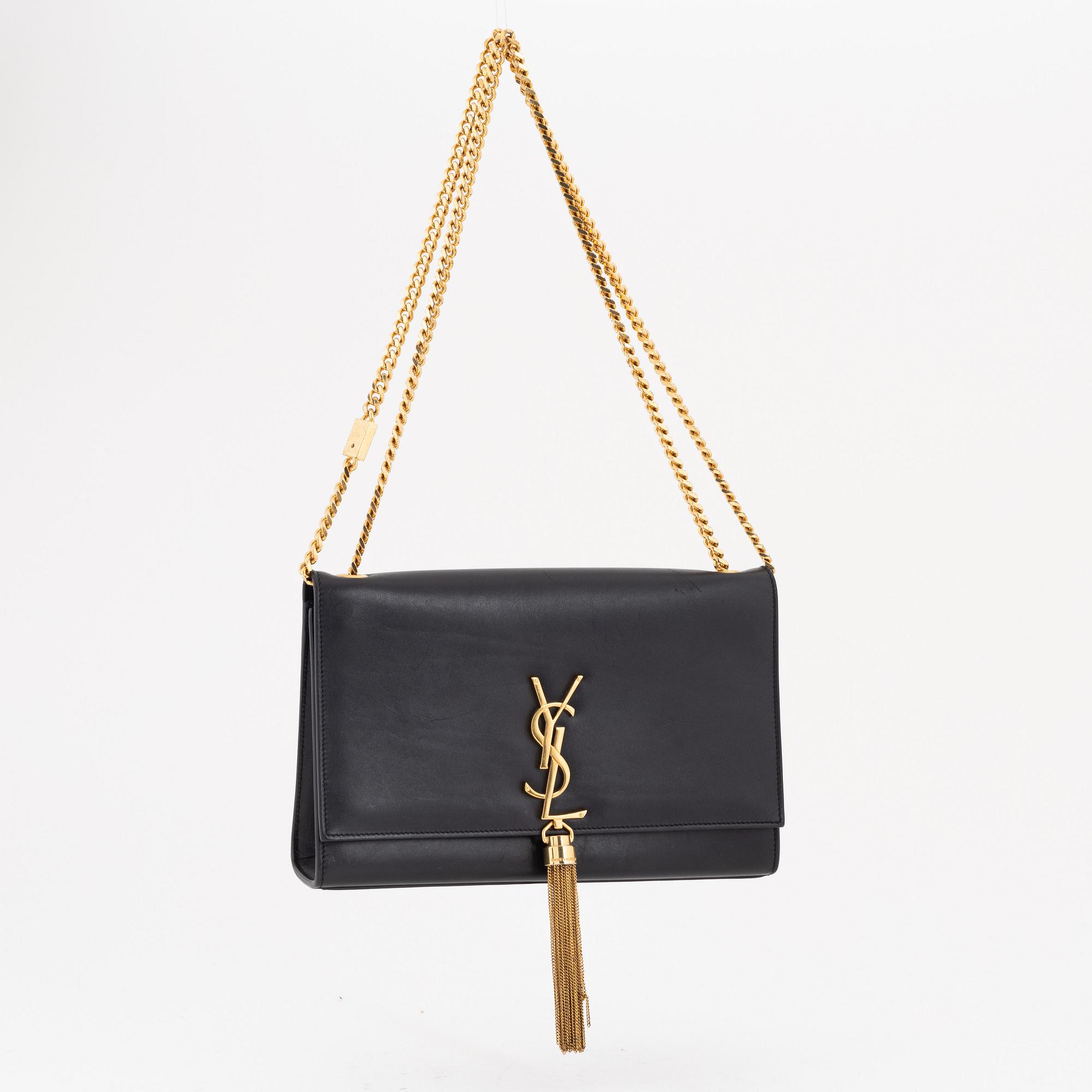 Yves Saint Laurent, a black smooth leather 'Kate' handbag.