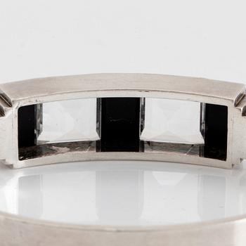 Wiwen Nilsson, a sterling silver bangle with facet cut rock crystal and onyx, Lund, Sweden 1940.