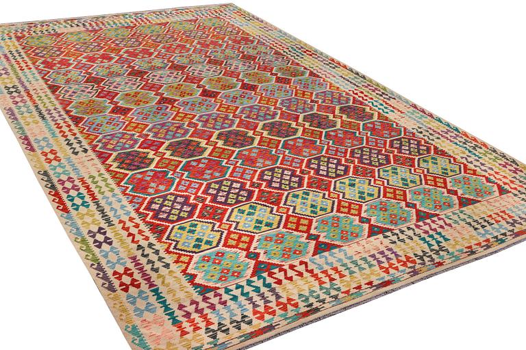 A Kilim carpet, c. 491 x 310 cm .