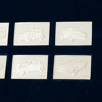 Plaketter, 12 st, silver, "De Historiska Volvobilarna 1927-1977", Franklin Mint.
