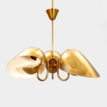 A 1940s Carl-Axel Acking brass ceiling pendant from Bröderna Malmströms.