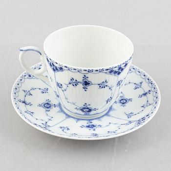 A large 'Blue Fluted Half Lace' porcelain tea cup with saucer, Royal Copenhagen, model 703, post 1923.