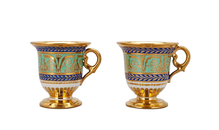 A PAIR OF CREAM CUPS.