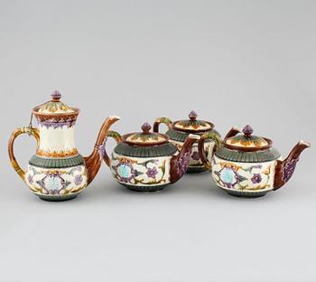 A majolica collection of one coffee pot and three tea pots from Rörstrand, around turn of the century 1900.