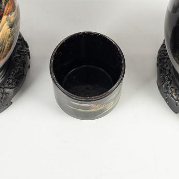 A pair of Japan lacquered vases and a brushpot/bottom for a box, around 1900.