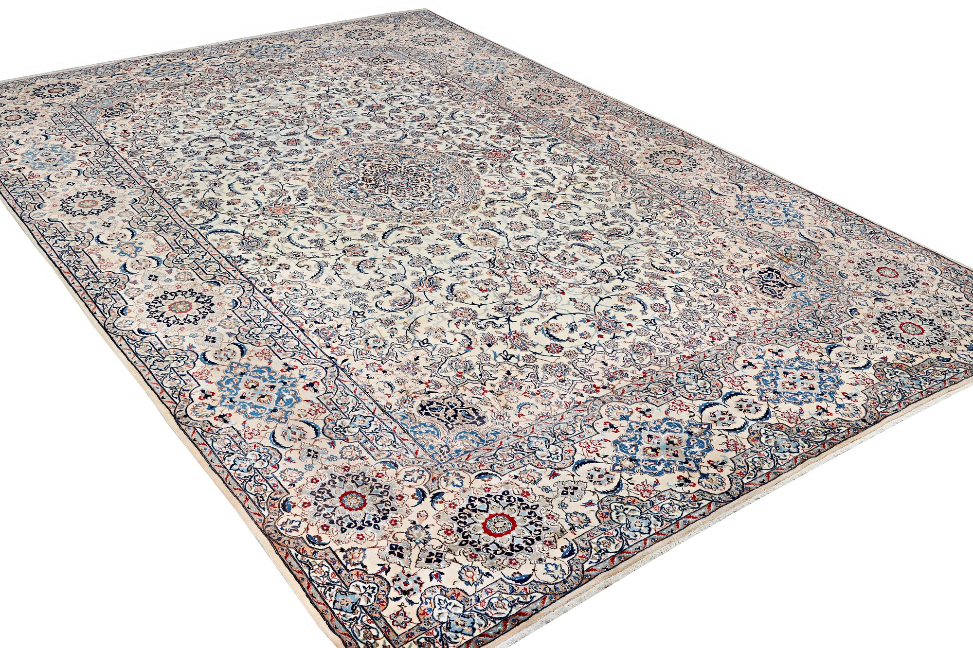 A Nain carpet, part silk, 9 laa, c. 453 x 298 cm.