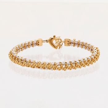 An 18K white and red gold necklace by D'orica Italy.