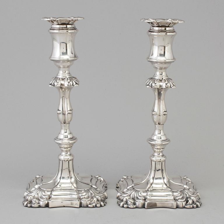 A pair of English silver candlesticks by Henry Wilkinson, London 1895.