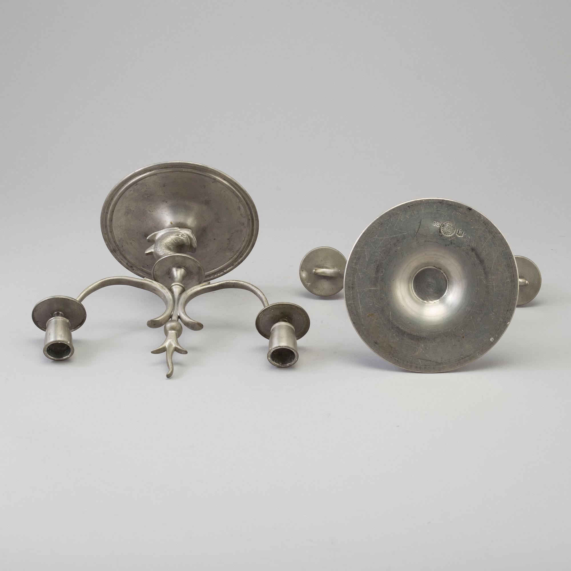 A pair of pewter chandeliers, Firma Svenskt Tenn, Stockholm 1928.