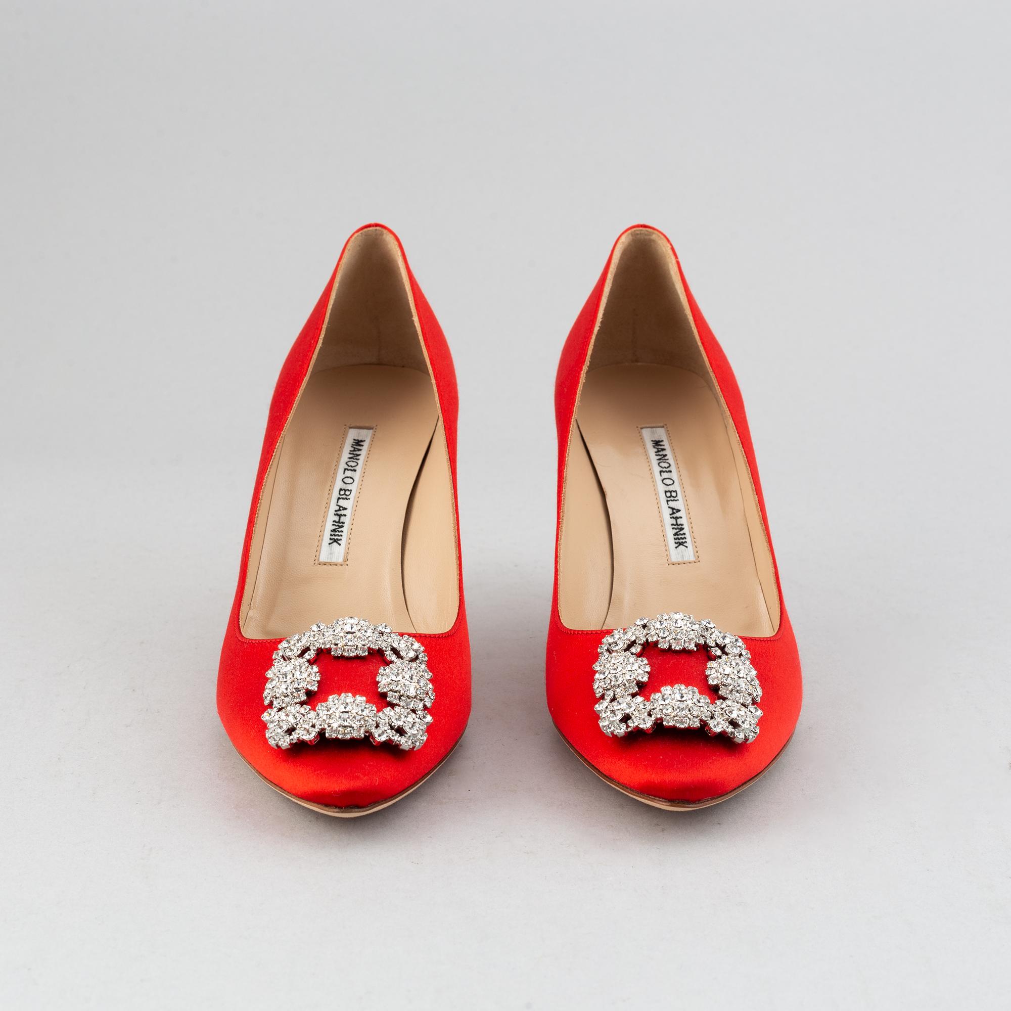 Manolo Blahnik, a pair of red satin 'Hangisi' shoes, 2020, size 38½.