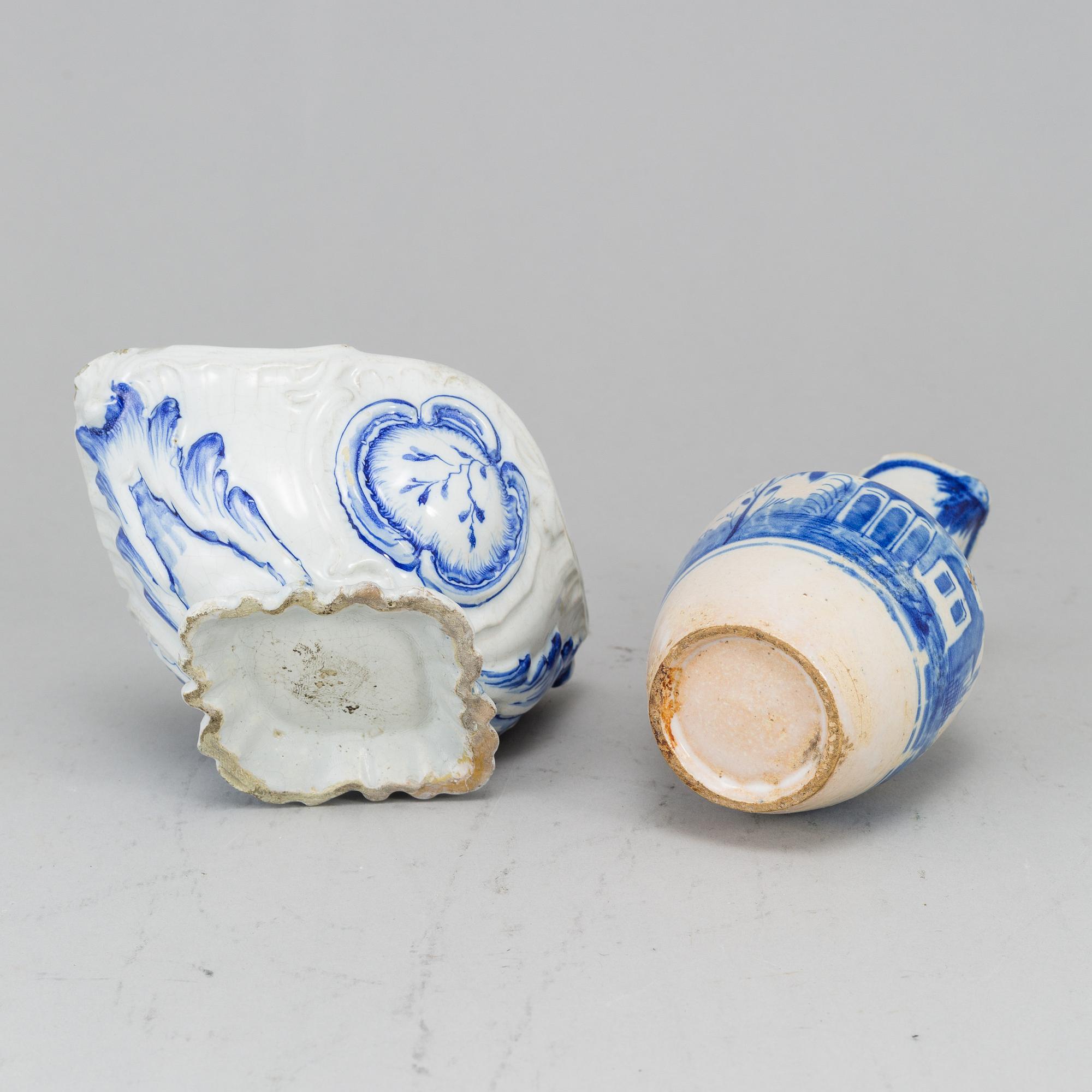 A faience tureen, unmarked, presumably Mariberg, 18th Century and a ewer with cover, 18th Century, unmarked.