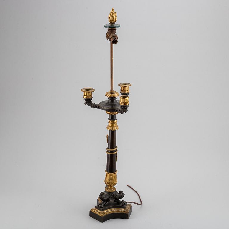 A first half of the 19th century bronze table lamp.