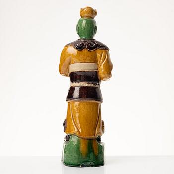 A stoneware figurine, China, Ming style but 20th century.
