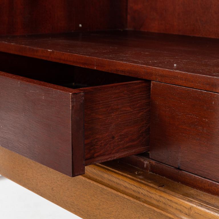 A leather, oak and mahogany cabinet, mid 20th Century.