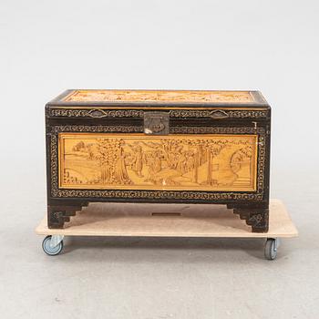 An Asian wooden coffin 20th century.