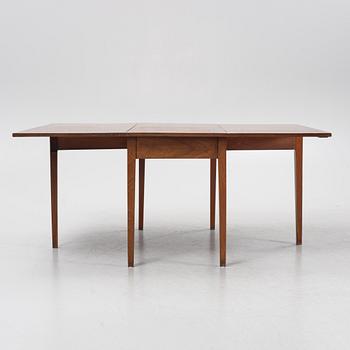 A mahogany drop leaf hunter's table, 19th Century.