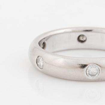 An 18K white gold Cartier ring set with round brilliant-cut diamonds.