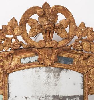 A presumably French Régence giltwood mirror, first part 18th century.