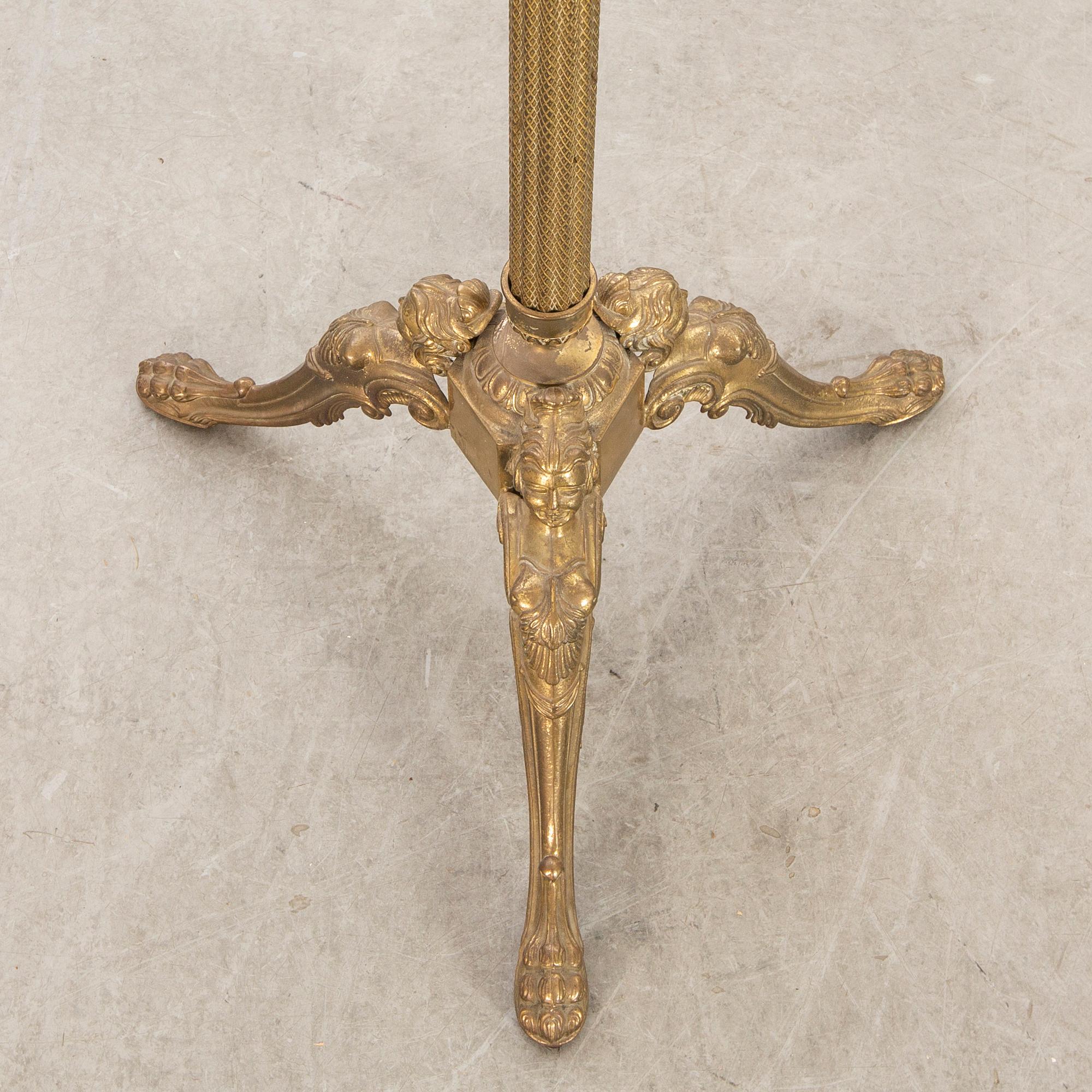 A brass coat hanger alter part of the 20th century.