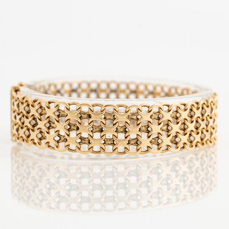 Arm bracelet, 18K gold, x-link.