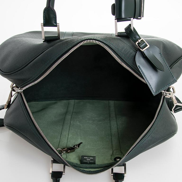 Louis Vuitton, a 'Taiga Kendall PM' bag.