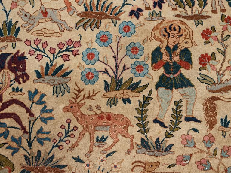 A CARPET, a semi-antique Tabriz figural, ca 327-333,5 x 236,5-240 cm.