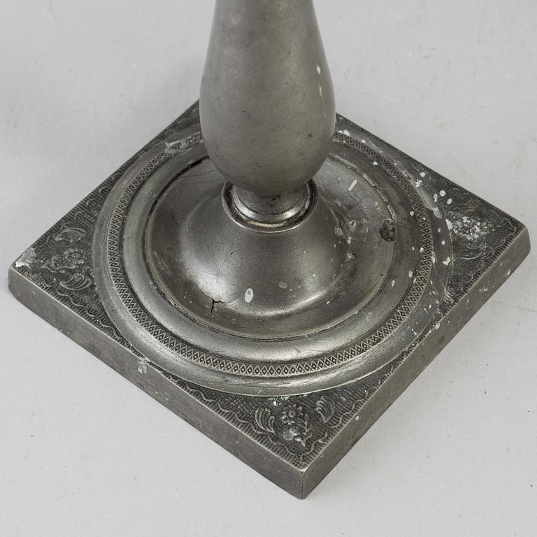 A pair of empire pewter candlesticks, first half of the 19th century.