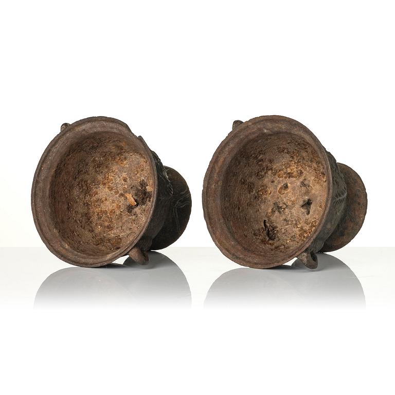 A pair of cast-iron garden urns, presumably from Näfveqvarns styckebruk, dated 1789.