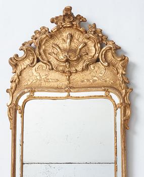 A Swedish Rococo mirror dated 1763.