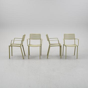 Four 'Easy' aluminum armchairs from FAST furniture.