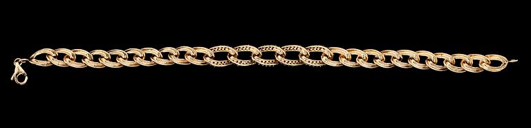 ARMBAND, 14K guld med olikfärgade safirer och tsavoriter. Total vikt ca 21 g.