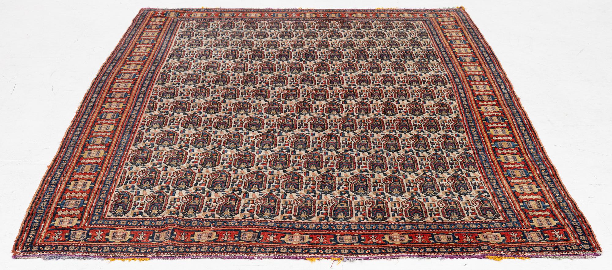An antique Senneh rug, c 192 x 140 cm.