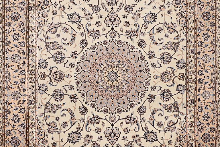 A carpet, Nain, part silk, 6 laa, c. 316 x 210 cm.