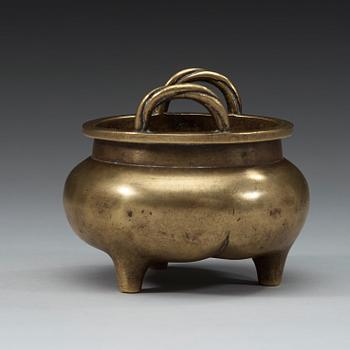 A bronze tripod censer, Qing dynasty, 19th Century.