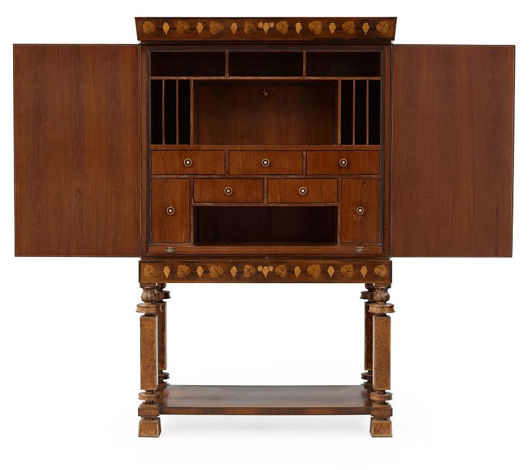 A Gösta Thorell cabinet on stand, Stockholm 1929, executed by Georg Ryman.