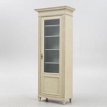 A display cabinet, late 19th Century.