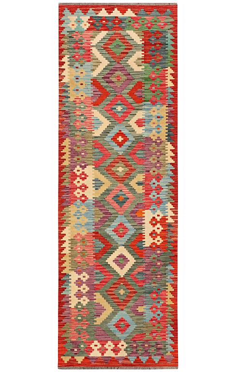 A carpet, Kilim, c. 289 x 78 cm.